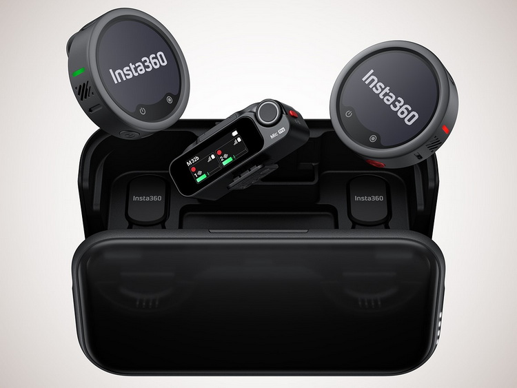 a_mic_pro_case_sits_with_the_transmitters_and_receiver_floating_out_of_it.jpeg
